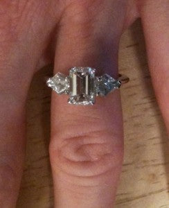 Emerald cut with hot sale side stones