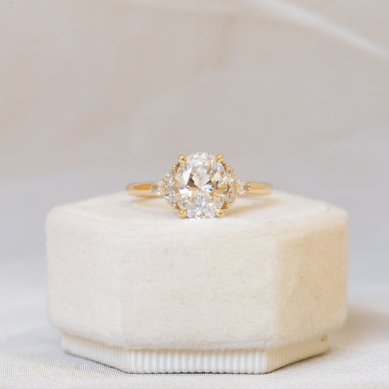 14ky Oval with Pear and Round Side Diamond Ring