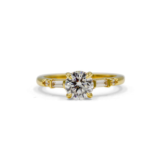 14ky .20ctw Round & Baguette Diamond Ring